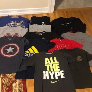 Lot of boys medium t-shirts and one small. 2 tank tops